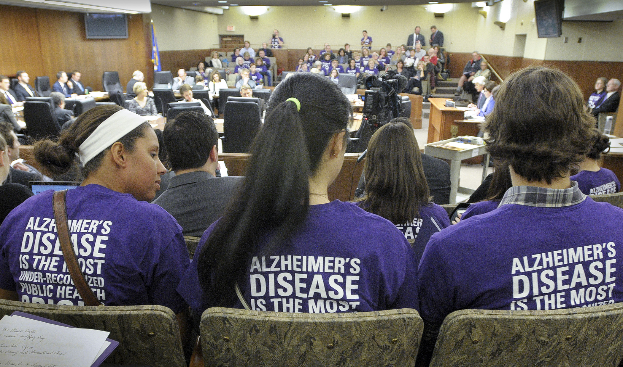 Advocates for an Alzheimer’s disease cure fill the House Health and Human Services Finance Committee hearing room Jan. 21 during a presentation by the Alzheimer’s Association. Photo by Andrew VonBank